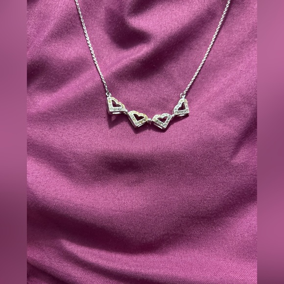18 inch necklace. Sterling silver. Charm open up to 3 hearts. - Picture 3 of 4